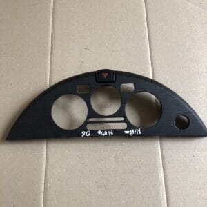 Alternative view of NISSAN NOTE E11 CENTER DASH SURROUND TRIM WITH HAZARD SWITCH OEM N103451V
