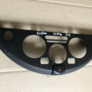 NISSAN NOTE E11 CENTER DASH SURROUND TRIM WITH HAZARD SWITCH OEM N103451V
